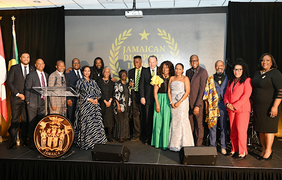 Honourees and guests on stage at a Jamaican Diaspora Impact Awards gala